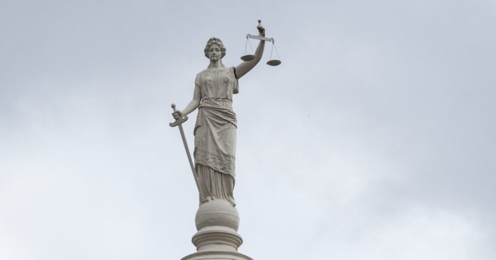 Lady Justice statue with scales and sword