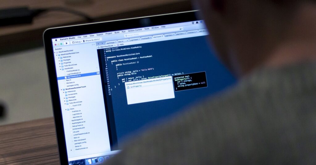 Laptop with code on screen